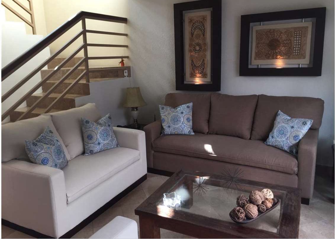 Matching upholstered sofas in a Los Cabos residence