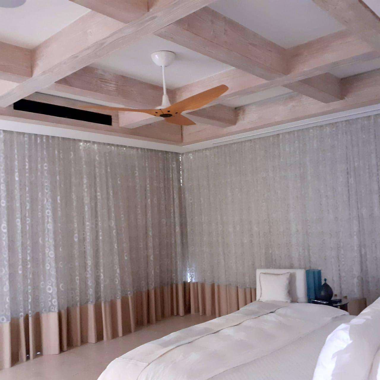 Floor-to-ceiling custom sheer drapery in a Los Cabos resort suite