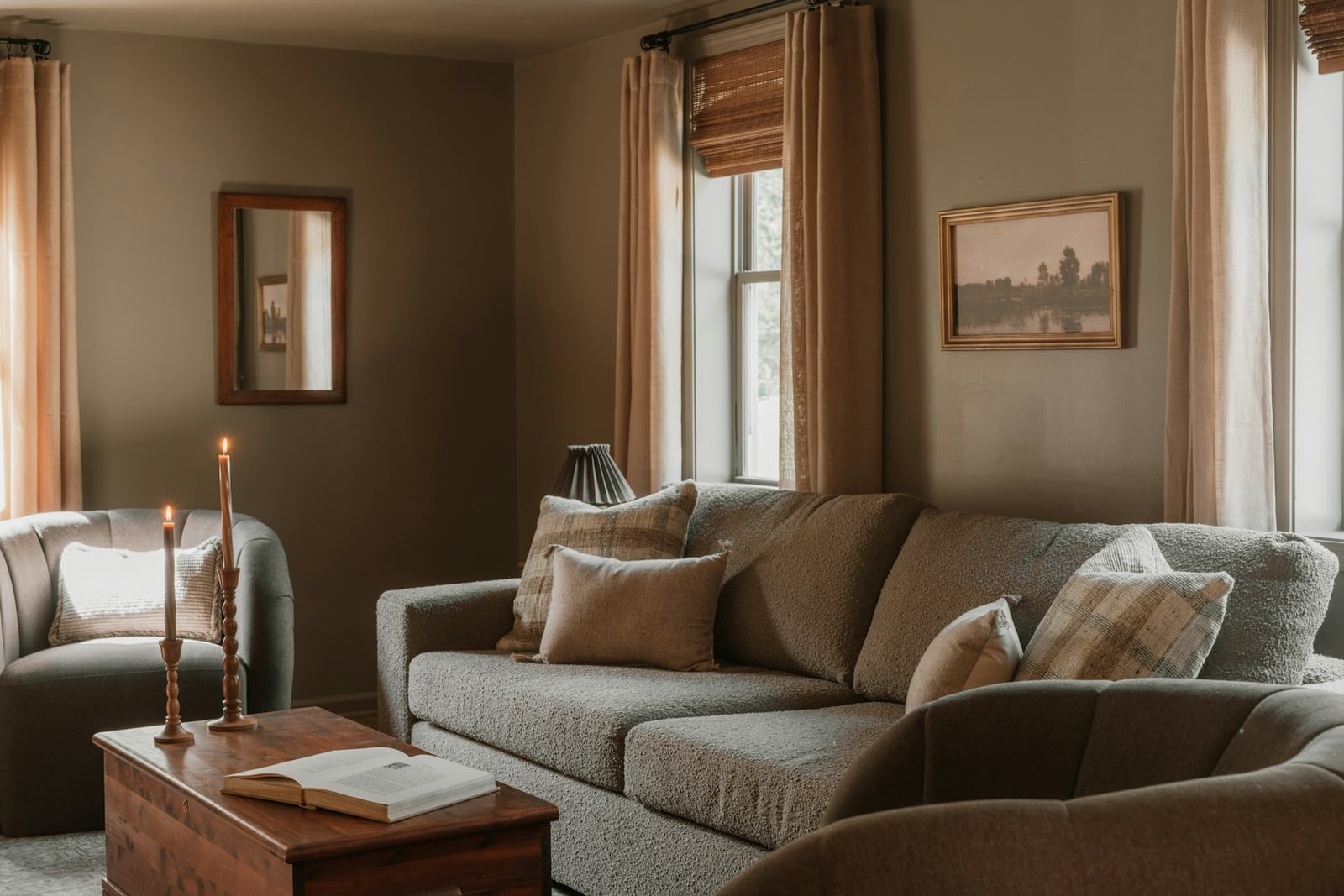 Reupholstered sofa with custom cushions and drapery